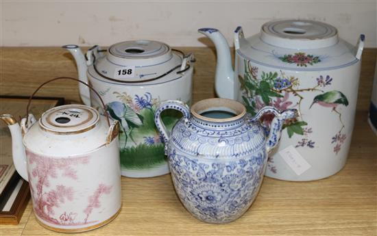Three Chinese porcelain tea kettles and a blue and white wine pot, largest 21cm